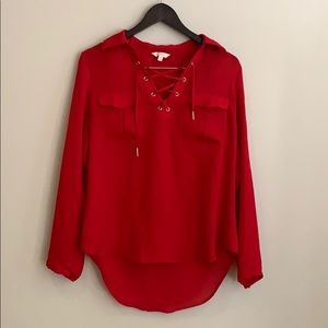 Red chiffon blouse with cross top.